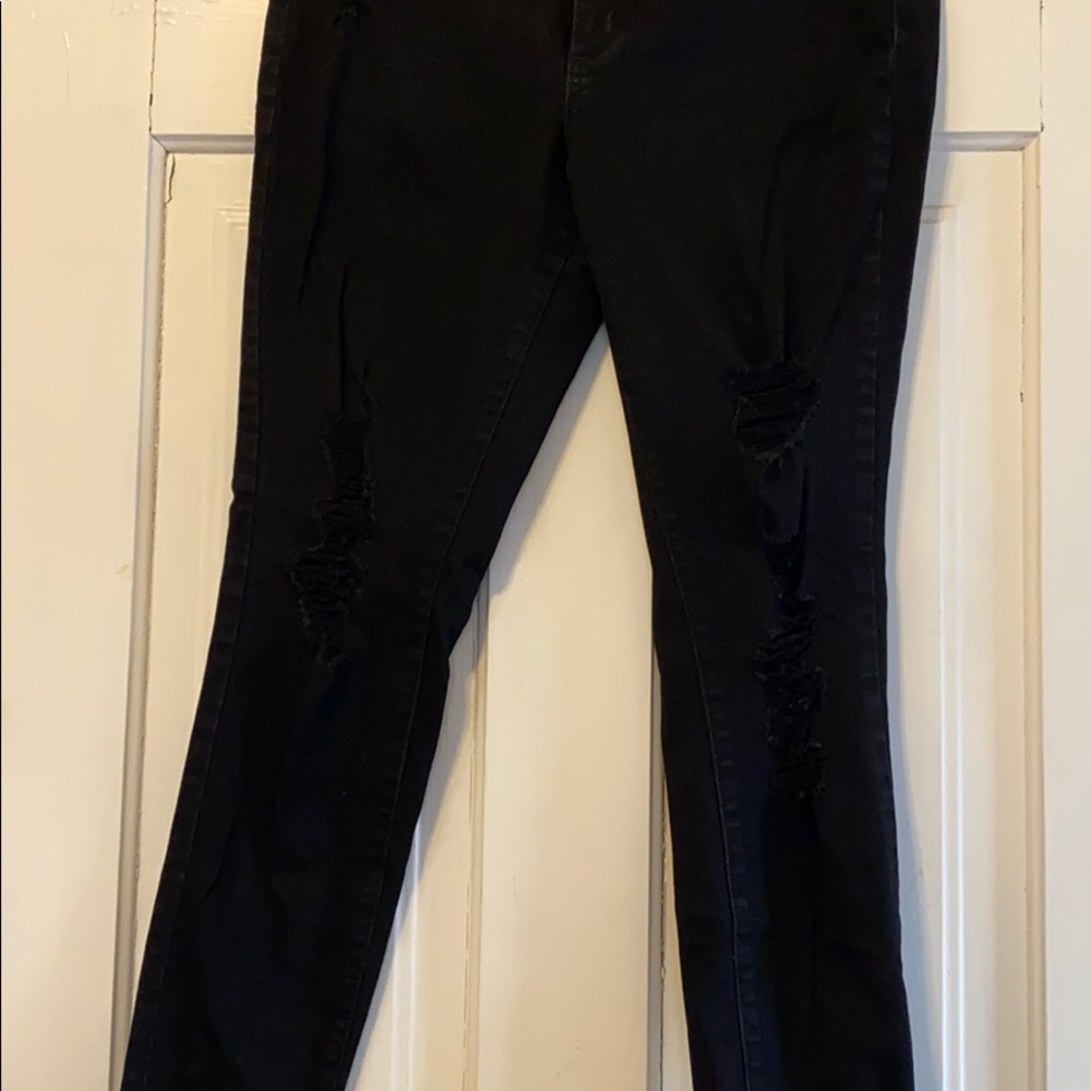 In perfect shape distressed black skinny
